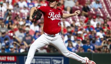 Surging Reds blank Cubs, move into tie for NL wild card spot