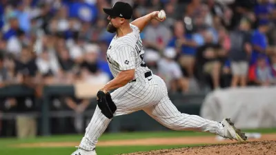 Jul 26, 2025; Chicago, Illinois, USA; Chicago White Sox pitcher Dan Altavilla (58) pitches during the eighth inning against the Chicago Cubs at Rate Field.