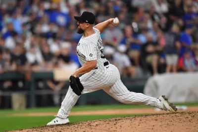 Jul 26, 2025; Chicago, Illinois, USA; Chicago White Sox pitcher Dan Altavilla (58) pitches during the eighth inning against the Chicago Cubs at Rate Field.