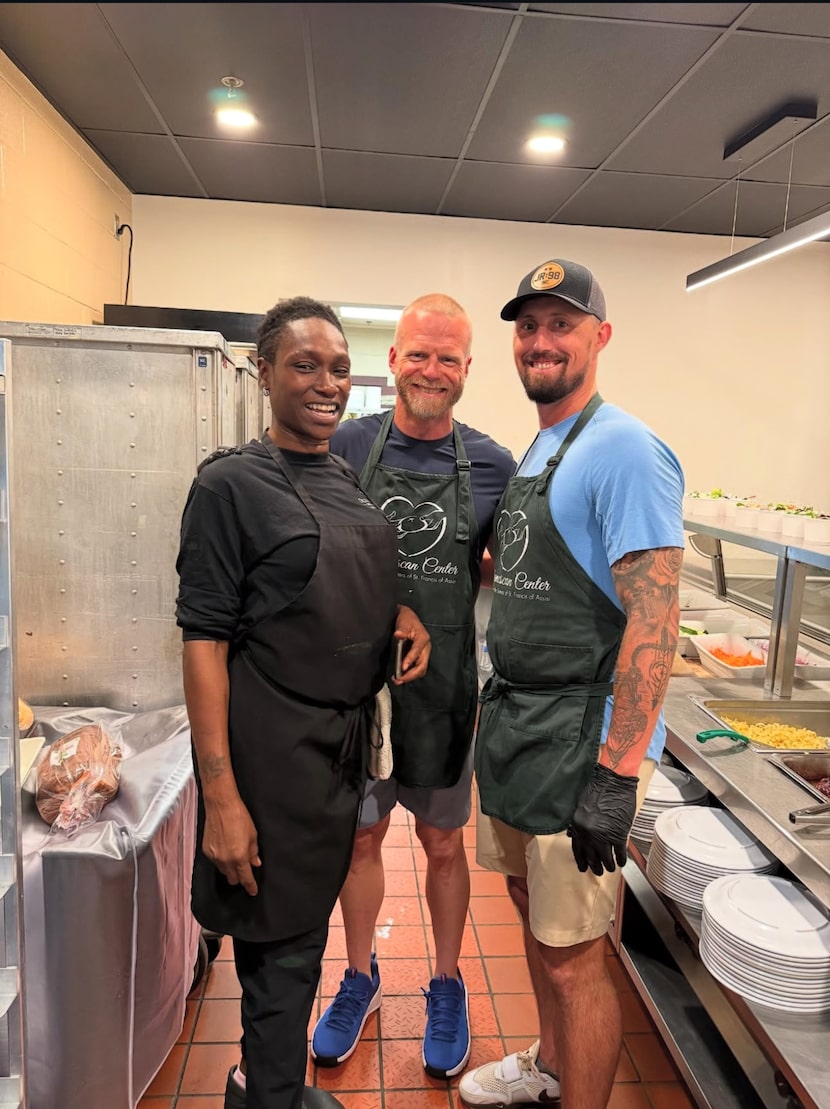 Rangers' Shawn Armstrong (right), Rangers' staffer Josh Frasier (center) at the Franciscan...