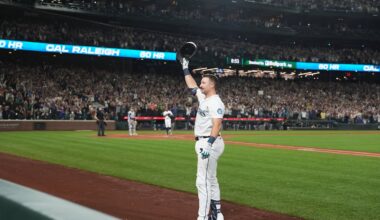The Mariners' Cal Raleigh waves to the crowd after hitting his 60th home run of the season on Wednesday night.