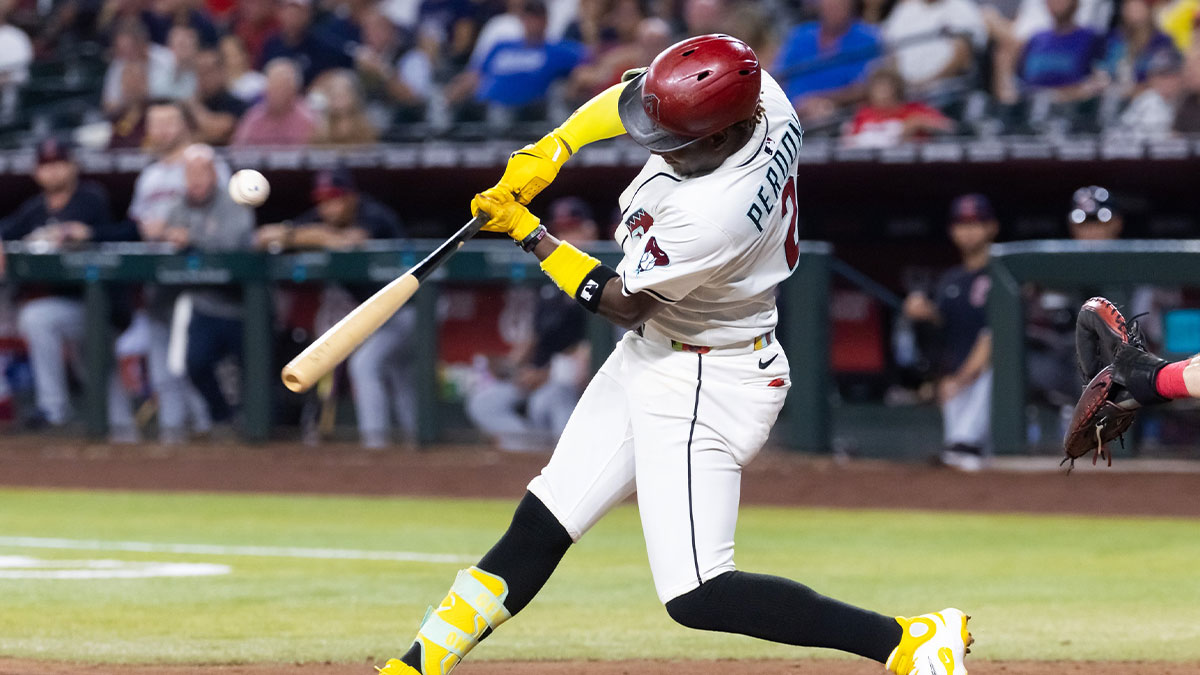 Aug 19, 2025; Phoenix, Arizona, USA; Arizona Diamondbacks infielder Geraldo Perdomo hits an RBI single in the fifth inning against the Cleveland Guardians at Chase Field. 