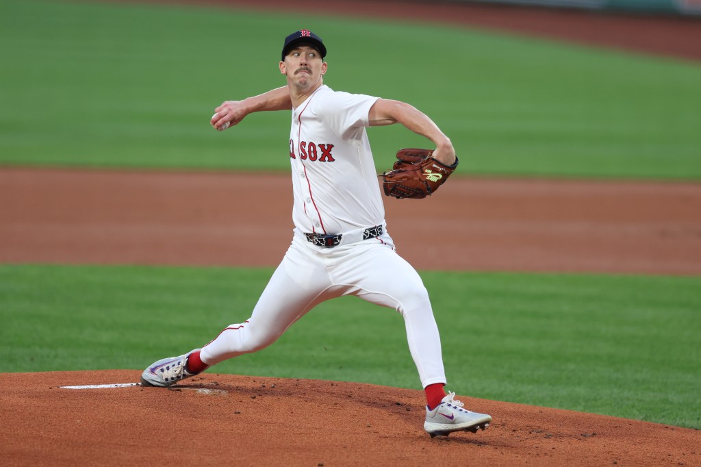 Walker Buehler delivers a pitch during the first inning against the Baltimore Orioles at Fenway Park on August 19, 2025 in Boston, Massachusetts. 