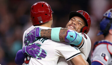 Ketel Marte #4 (R) of the Arizona Diamondbacks...