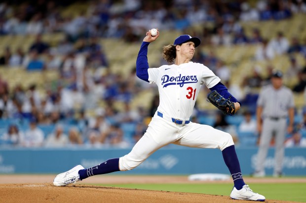Dodgers starting pitcher Tyler Glasnow throws to the plate during...