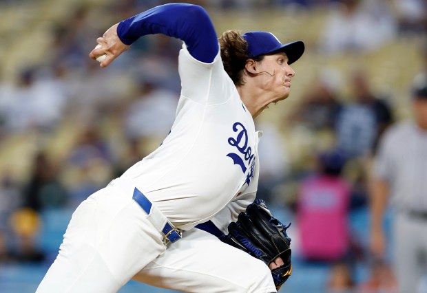 Dodgers starting pitcher Tyler Glasnow throws to the plate during...