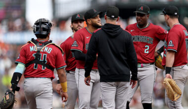 Manager Torey Lovullo takes out Eduardo Rodriguez #57 of the Arizona Diamondbacks...