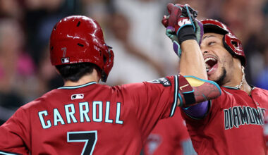 Ketel Marte #4 celebrates with Corbin Carroll #7 of the Arizona Diamondbacks...