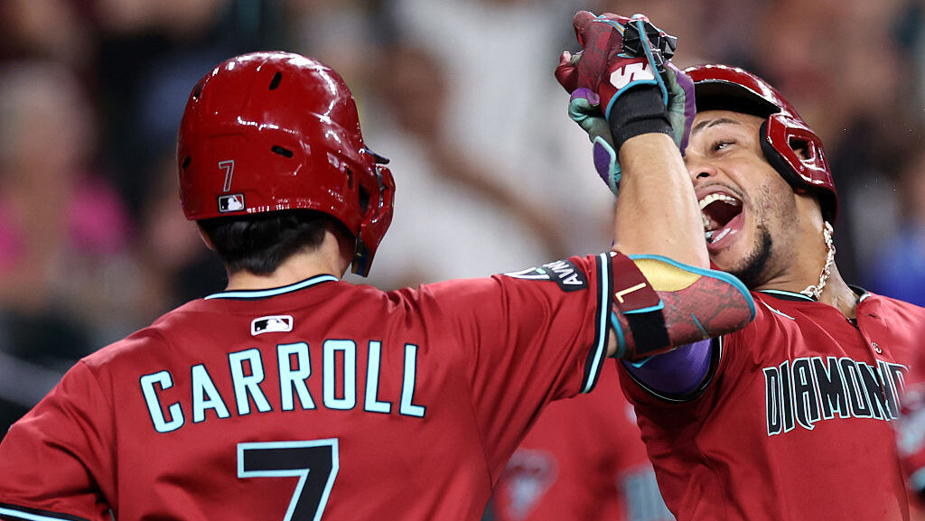 Ketel Marte #4 celebrates with Corbin Carroll #7 of the Arizona Diamondbacks...