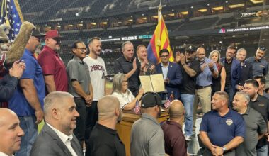 Arizona Gov. Katie Hobbs signs Chase Field bill with Diamondbacks CEO Derrick Hall...