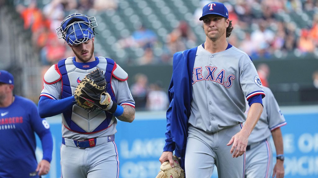 Texas Rangers pitcher Jacob DeGrom (right) and catcher Jonah Heim (left) prior to the game against the Baltimore Orioles at Oriole Park at Camden Yards.