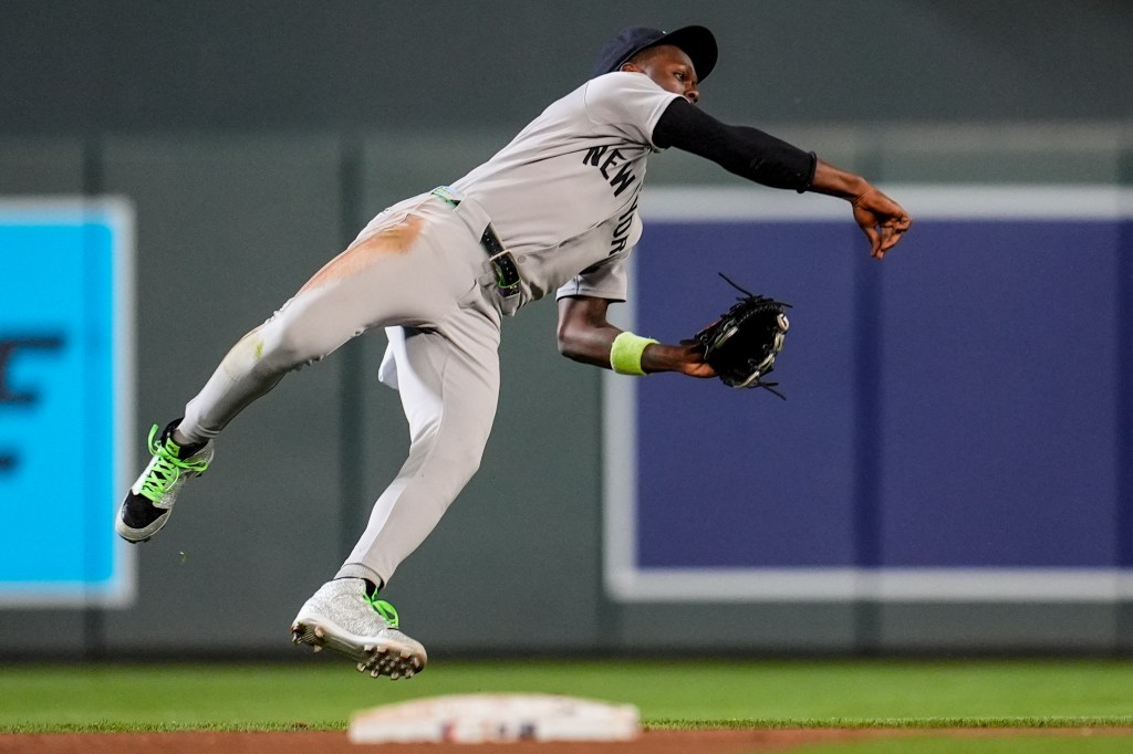 Jazz Chisholm makes an acrobatic play to rob Brooks Lee of a hit in the fourth inning o the Yankees' 10-5 road win over the Twins on Sept. 17, 2025.