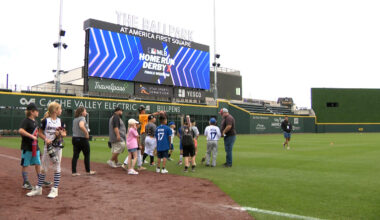 Kids standing in America First Square field....