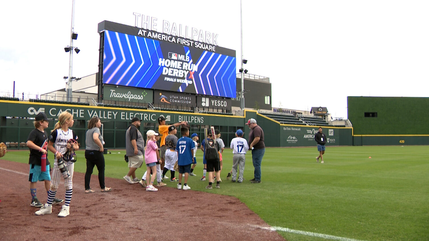 Kids standing in America First Square field....