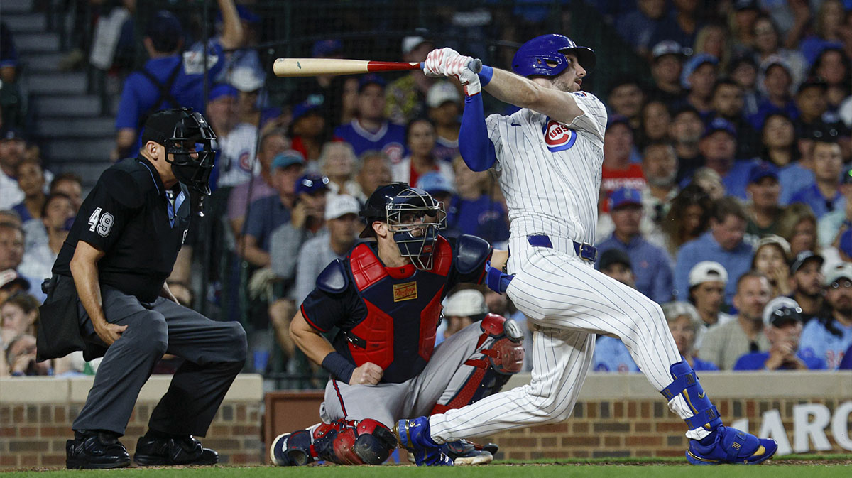 Chicago Cubs right fielder Kyle Tucker (30) hits a three-run home run against the Atlanta Braves during the third inning at Wrigley Field.