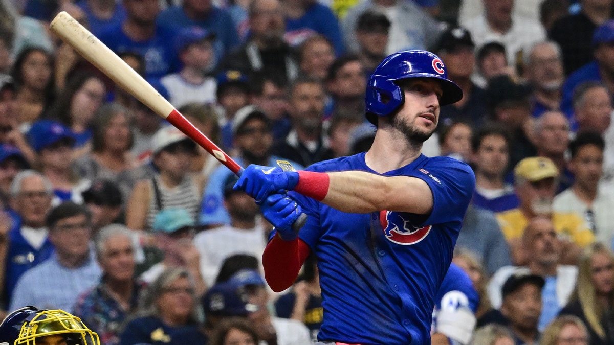 Chicago Cubs right fielder Kyle Tucker (30) hits a double to drive in two runs in the sixth inning against the Milwaukee Brewers at American Family Field.