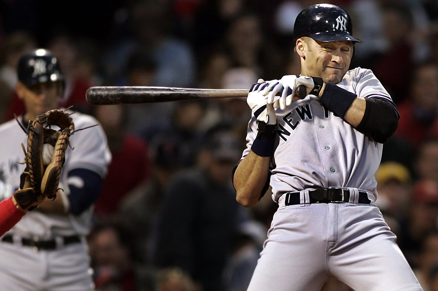 Yankees shortstop Derek Jeter had to back out of the way of a Martinez pitch during Game 5. Jeter batted .200 in the series.