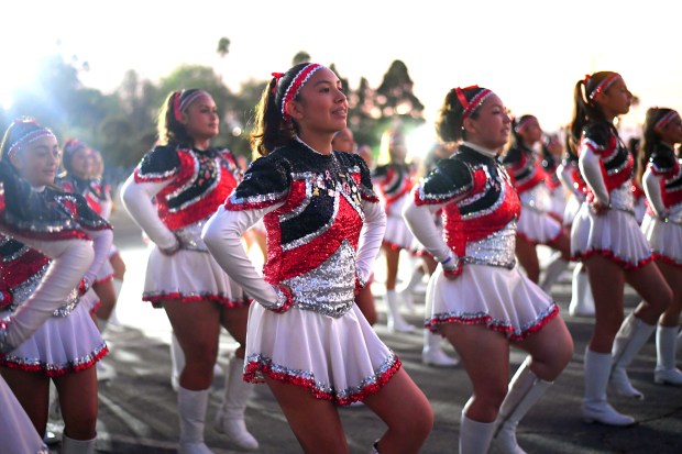 Members of the Banning High School drill team perform during...