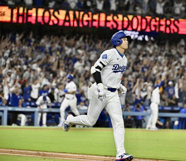 Dodgers star Shohei Ohtani hits a go-ahead three-run home run...