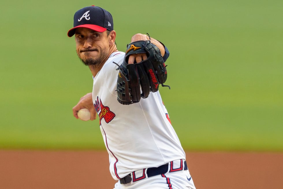 Atlanta Braves pitcher Charlie Morton throws in the first inning of a make-up baseball game...