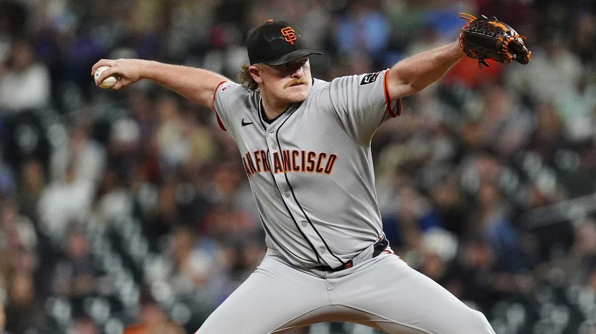 San Francisco Giants starting pitcher Logan Webb (62) delivers a pitch in the fifth inning against the Colorado Rockies at Coors Field.
