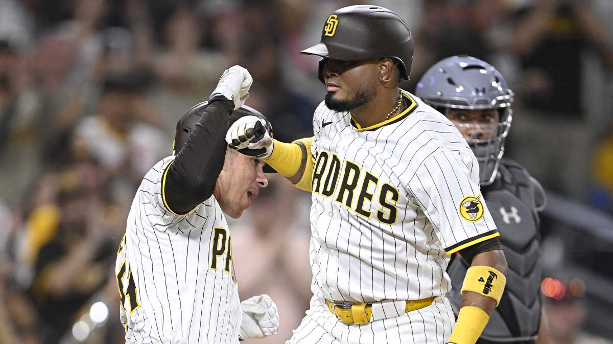 San Diego Padres first baseman Luis Arraez (4) is congratulated Freddy Fermin (54) after hitting a two-run home run during the third inning against the Baltimore Orioles at Petco Park. 