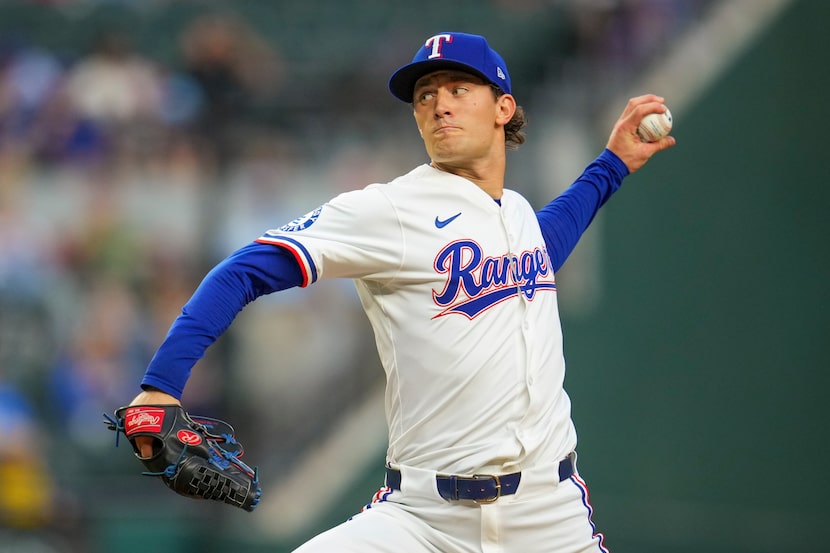 Texas Rangers starting pitcher Jacob Latz throws against the Milwaukee Brewers during the...