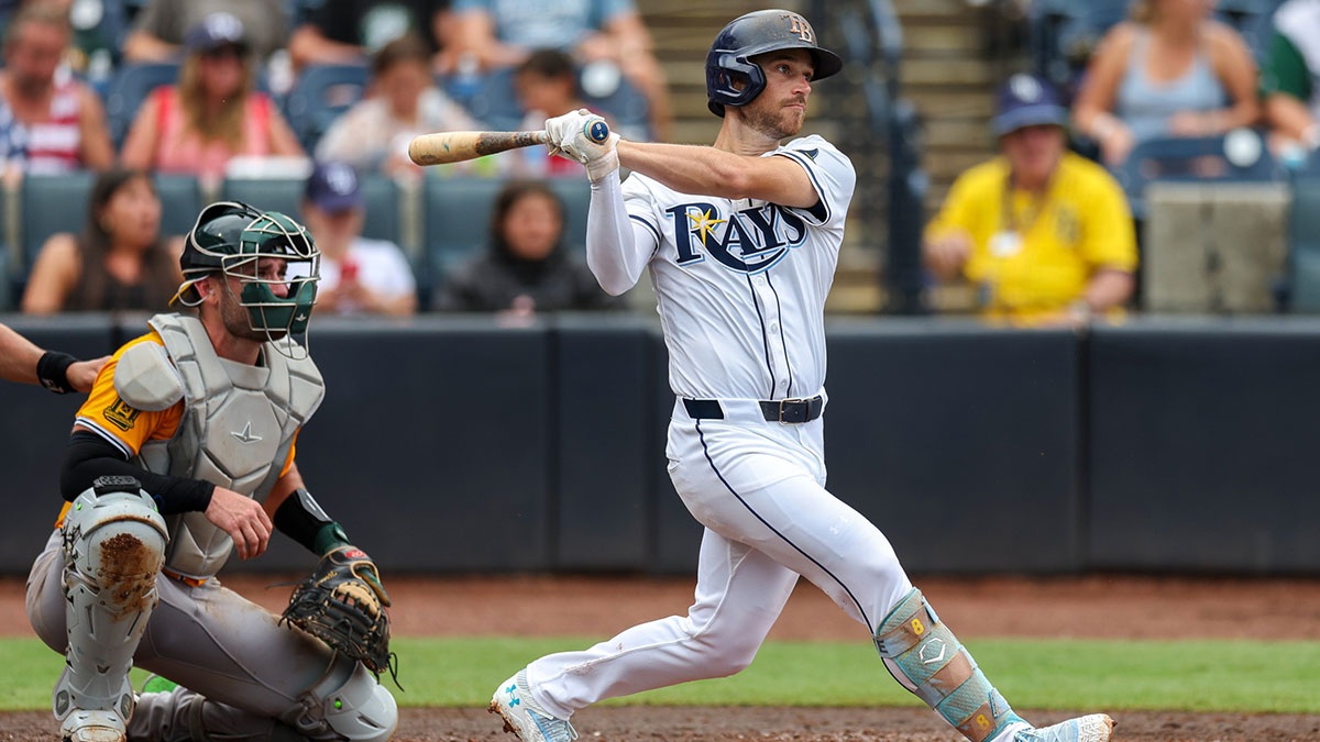 Tampa Bay Rays second baseman Brandon Lowe (8) doubles against the Oakland Athletics in the sixth inning at George M. Steinbrenner Field.