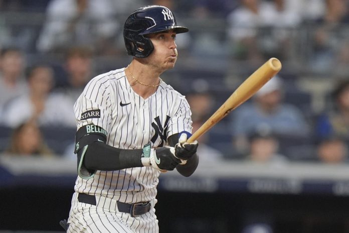PLAYOFFS - PLAYOFFS - New York Yankees' Cody Bellinger follows through on a three-run home run during the third inning of a baseball game against the Tampa Bay Rays Tuesday, July 29, 2025, in New York. (AP Photo/Frank Franklin II)
