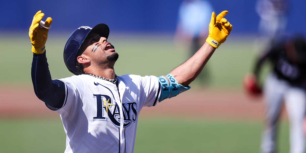 Tampa Bay Rays left fielder Christopher Morel (24) celebrates after hitting a three run home run against the Miami Marlins in the second inning at George M. Steinbrenner Field.