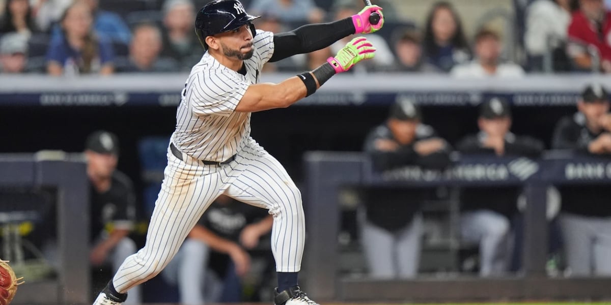 Yankees rally past White Sox 3-2, clinch playoff berth and close within 1 game of Toronto in AL East