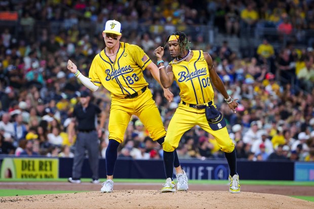 Noah Niznik #88 and Maceo of the Savannah Bananas dance during their game at Petco Park on Friday, Sept. 5, 2025 in San Diego, CA. (Meg McLaughlin / The San Diego Union-Tribune)