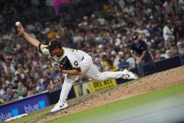 ....Jeremiah Estrada #56 of the San Diego Padres pitches against the Arizona Diamondbacks at Petco Park on Thursday, July 10, 2025 in San Diego, CA. (Michael Ho / The San Diego Union-Tribune)