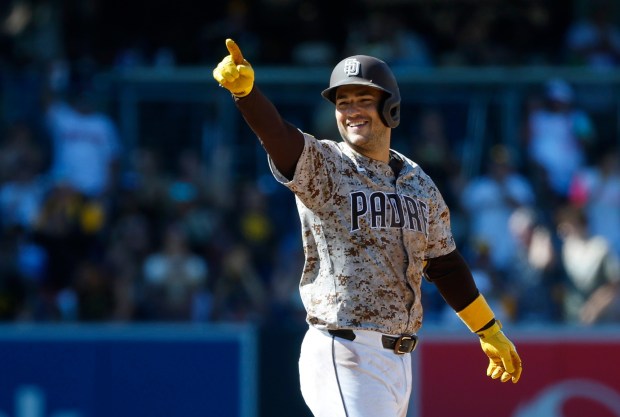 Jose Iglesias #7 of the San Diego Padres celebrates a two-run double in the seventh inning against the Arizona Diamondbacks at Petco Park on Sept. 28, 2025 in San Diego, California. (K.C. Alfred / The San Diego Union-Tribune)
