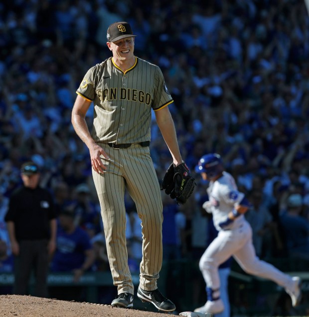 Nick Pivetta #27 of the San Diego Padres looks on after a solo home run by Carson Kelly #15 of the Chicago Cubs in the sixth inning during Game 1 of the NL Wild Card Series at Wrigley Field on Sept. 30, 2025 in Chicago, Illinois. (Photo by K.C. Alfred / The San Diego Union-Tribune)