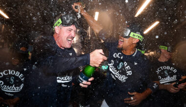 Seattle Mariners Dan Wilson Julio Rodriguez champagne celebration playoff clinch 2025...