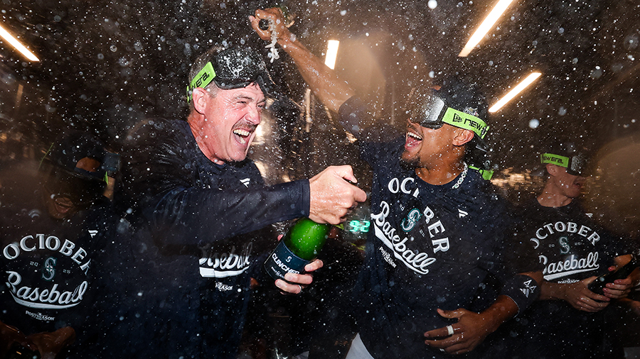 Seattle Mariners Dan Wilson Julio Rodriguez champagne celebration playoff clinch 2025...
