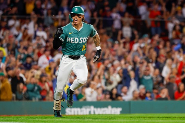 Boston Red Sox's Jarren Duran reacts after hitting a game-tying RBI single in the eighth inning of a baseball game against the Detroit Tigers, Friday, Sept. 26, 2025, in Boston. (AP Photo/Greg M. Cooper)