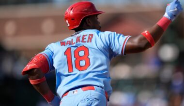 Busch stars as the Cubs beat the Cardinals 7-3 to clinch the top NL wild card