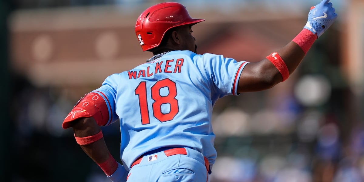 Busch stars as the Cubs beat the Cardinals 7-3 to clinch the top NL wild card