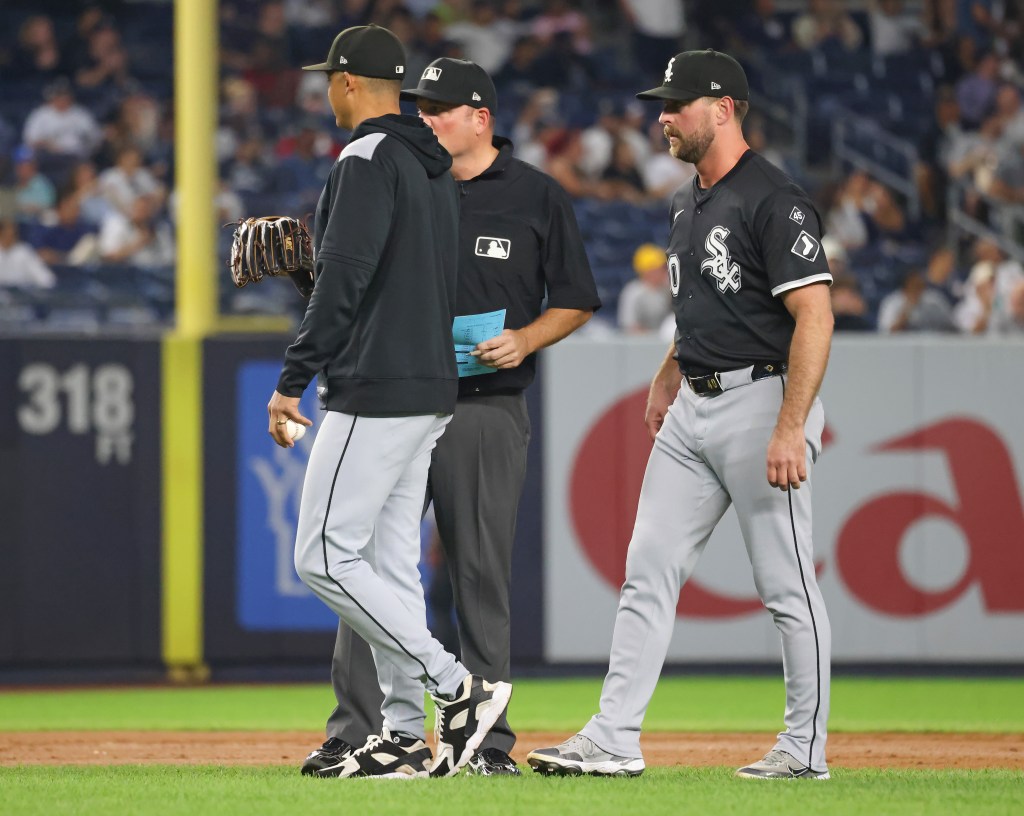 An umpire checks Tyler Gilbert's glove during the fifth inning of the Yankees' 5-3 win over the White Sox on Sept. 25, 2025.