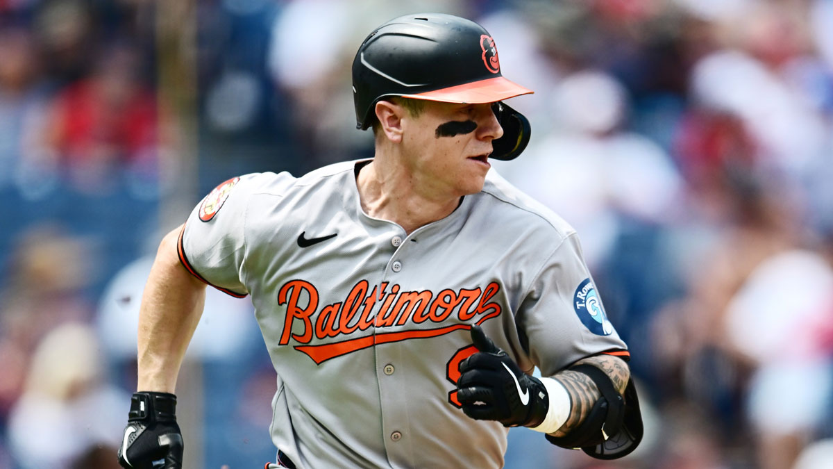 Baltimore Orioles right fielder Tyler O'Neill (9) hits a single during the first inning against the Cleveland Guardians at Progressive Field.