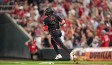 Cincinnati Reds' Spencer Steer rounds the bases after hitting a two-run home run during the sixth inning of a baseball game against the Chicago Cubs, Friday, Sept. 19, 2025, in Cincinnati. (AP Photo/Jeff Dean)