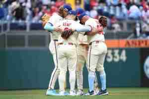 Jun 15, 2025; Philadelphia, Pennsylvania, USA; Philadelphia Phillies first baseman Otto Kemp (4), third baseman Alec Bohm (28), shortstop Trea Turner (7) and second base Edmundo Sosa (33) celebrate win against the Toronto Blue Jays at Citizens Bank Park. Mandatory Credit: Eric Hartline-Imagn Images