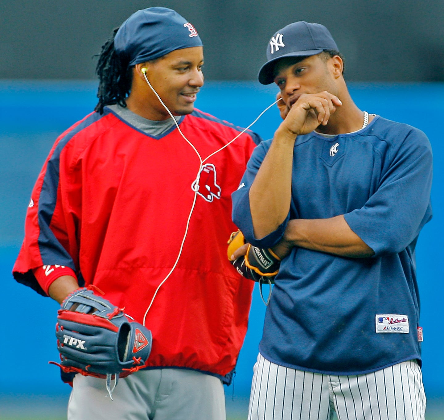 Manny Ramirez and Robinson Cano listened to music together before a regular season game in 2007.