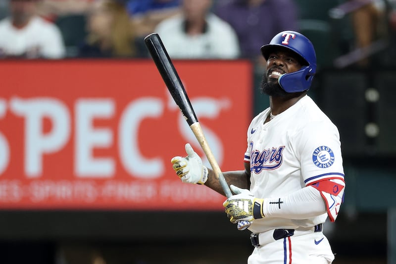 ARLINGTON, TEXAS - SEPTEMBER 23: Adolis García #53 of the Texas Rangers reacts to a called strike during the second inning against the Minnesota Twins at Globe Life Field on September 23, 2025 in Arlington, Texas. (Photo by Stacy Revere/Getty Images)
