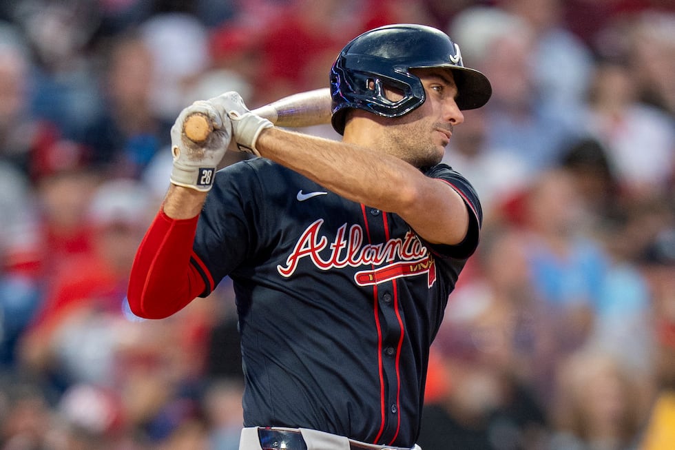 Atlanta Braves' Matt Olson hits a double scoring Jurickson Profar during the sixth inning of a...