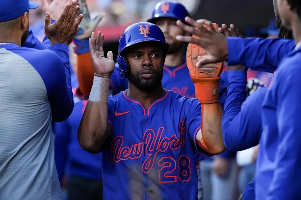 Cedric Mullins celebrates after scoring during the Mets’ Sept. 6 game. AP