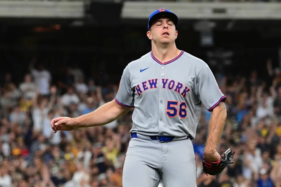 New York Mets pitcher Ryan Helsley (56) reacts after giving up the tying run in the eighth inning against the Milwaukee Brewers at American Family Field. Benny Sieu-Imagn Images