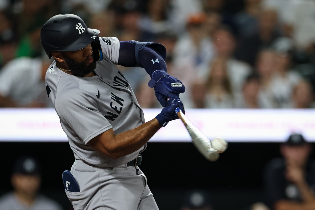 Amed Rosario hits a two-run double during the Yankees-Orioles game on Sept. 18, 2025.
